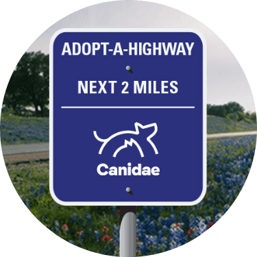 Adopt a highway road sign featuring the Canidae logo